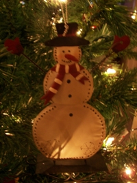 Snowman ornament on the tree