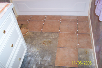 Practicing where the the tiles will go, not laying them yet