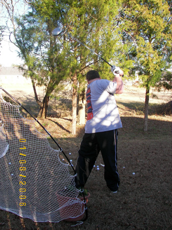 Tim practicing his swing