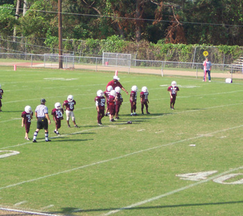 Zack playing football for the Raleigh Lions