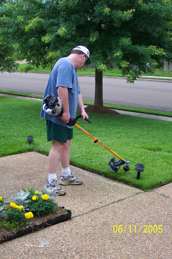 Tim with his new weedeater